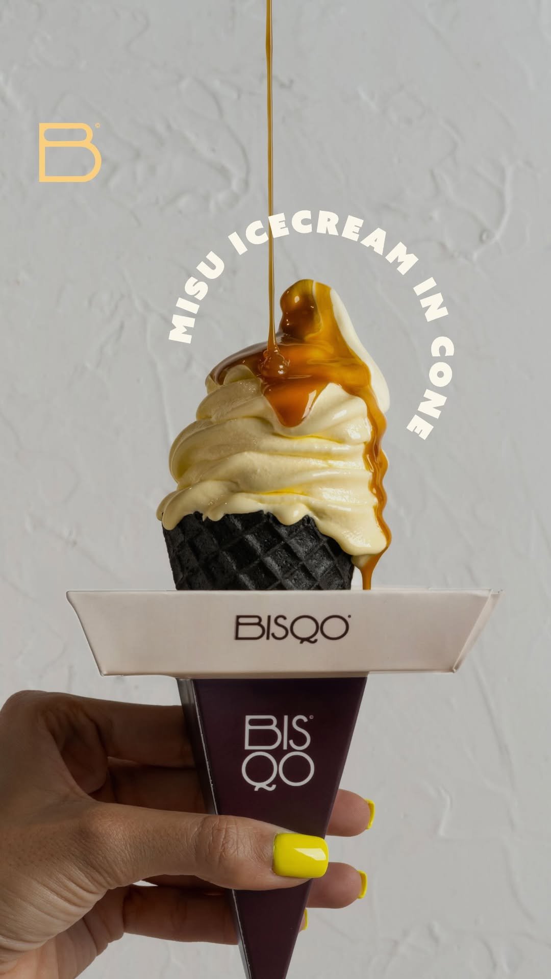 Misu Icecream in Cone, pure, silky tiramisu flavor churned into a cool soft-serve—enjoy it in a crisp w...